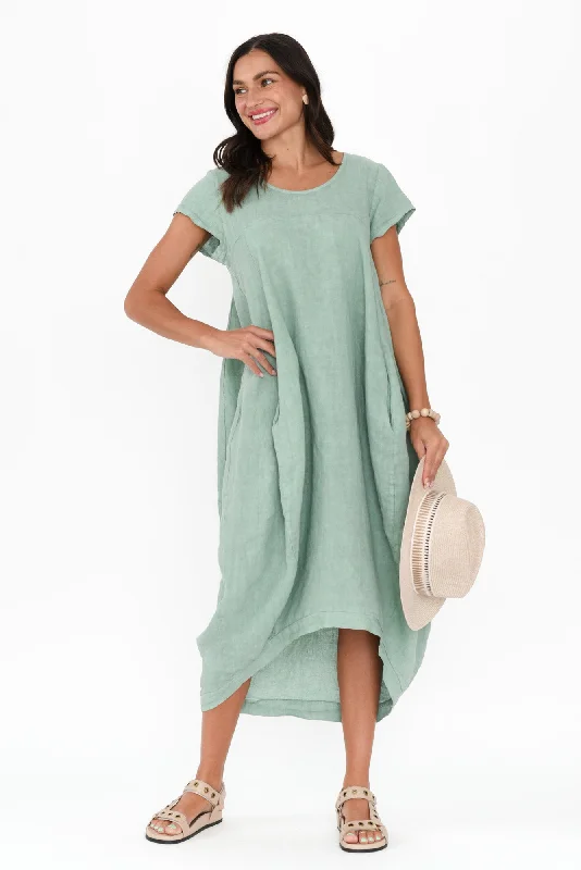 Midi dresses with ruched sleeves for a more fitted and stylish arm look Verity Sage Linen Dress Midi dresses with ruched sleeves for a more fitted and stylish arm look Verity Sage Linen Dress