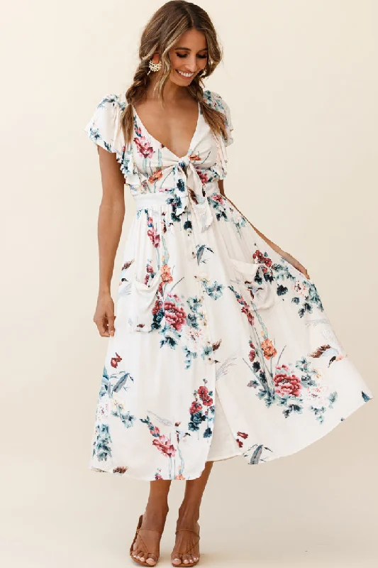 Ruffled Women Dress with Multiple Layers for a Playful and Girly StyleAmelie Tied Bust Pocket Midi Dress Floral Print Beige Ruffled Women Dress with Multiple Layers for a Playful and Girly StyleAmelie Tied Bust Pocket Midi Dress Floral Print Beige
