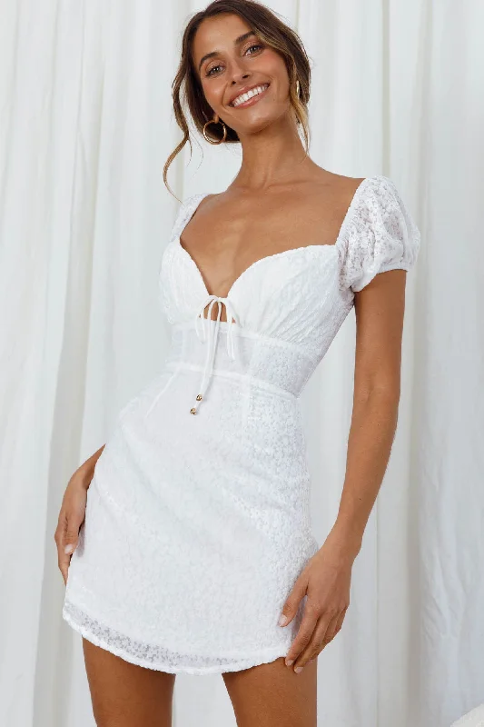 Shift Women Dress with a Simple and Classic Design for Everyday WearIn My Dreams Puff Sleeve String Tie Bust Textured Floral Dress White Shift Women Dress with a Simple and Classic Design for Everyday WearIn My Dreams Puff Sleeve String Tie Bust Textured Floral Dress White
