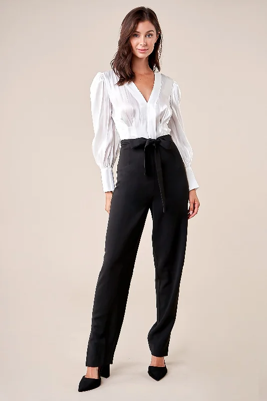 Women jumpsuits with asymmetric hems on the pants for a fashion - forward and dynamic lookMiss Punctuality Pleated Blouse Jumpsuit Women jumpsuits with asymmetric hems on the pants for a fashion - forward and dynamic lookMiss Punctuality Pleated Blouse Jumpsuit