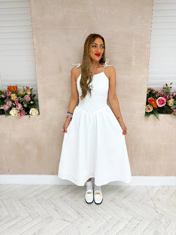 Midi dresses with pom - pom trims for a playful and festive lookCami Strap Shirring Dress in White Midi dresses with pom - pom trims for a playful and festive lookCami Strap Shirring Dress in White