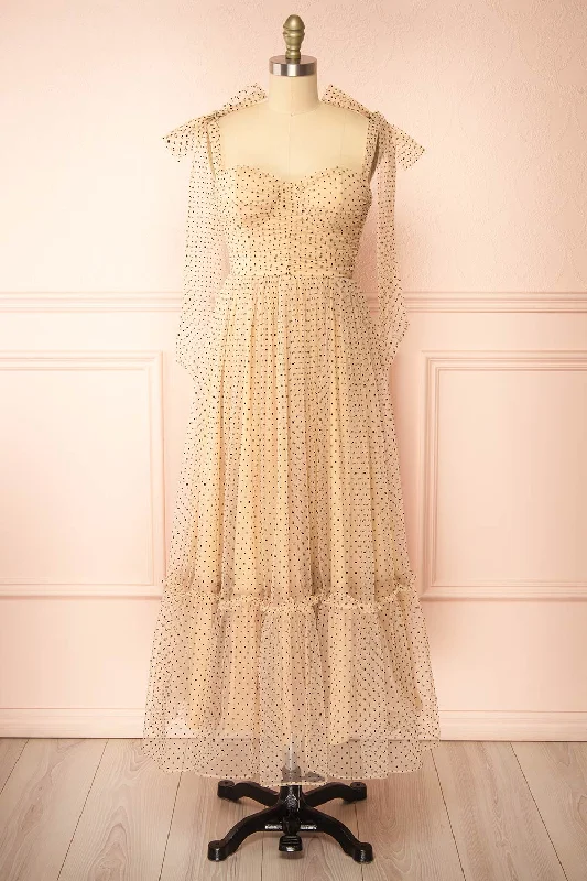 Midi dresses with animal prints for a bold and confident appearancePolkarine | Cream Tulle Maxi Dress w/ Polka Dots Midi dresses with animal prints for a bold and confident appearancePolkarine | Cream Tulle Maxi Dress w/ Polka Dots
