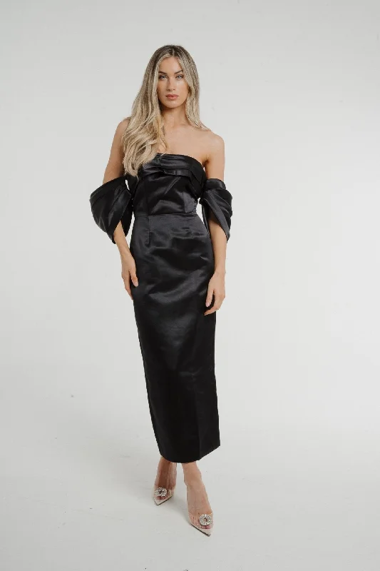 Maxi dresses with a pleated skirt for a timeless and elegant appearanceHolly Puff Sleeve Bardot Dress In Black Maxi dresses with a pleated skirt for a timeless and elegant appearanceHolly Puff Sleeve Bardot Dress In Black