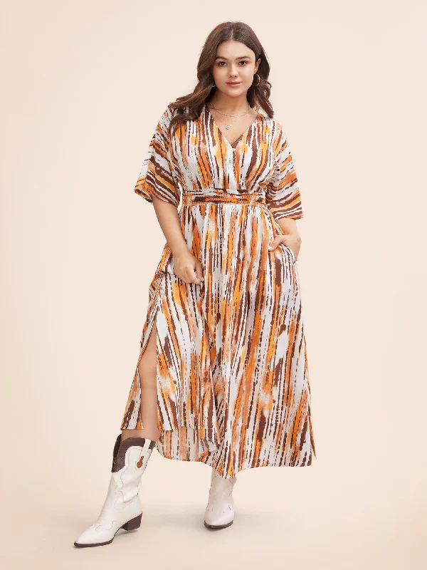 Ruffled maxi dresses with a tiered skirt for added volumeStriped Overlap Collar Shirred Maxi Dress Ruffled maxi dresses with a tiered skirt for added volumeStriped Overlap Collar Shirred Maxi Dress
