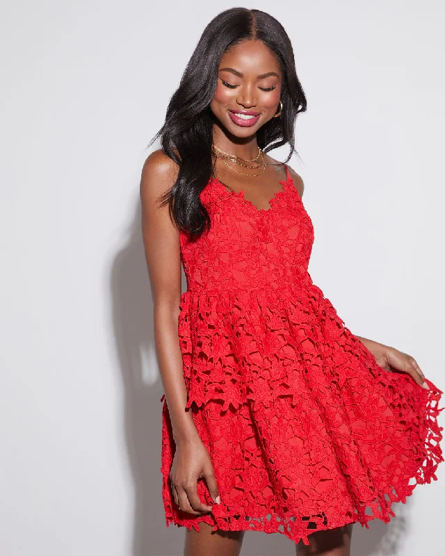 Mini dresses with pom - pom trims for a playful feelAlaina Embroidered Mini Dress