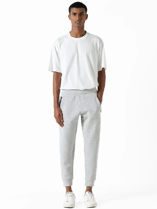 Solid Color Women Shorts in Bright Hues for a Bold StatementStudiofit Grey Melange Slim-Fit Mid-Rise Joggers Solid Color Women Shorts in Bright Hues for a Bold StatementStudiofit Grey Melange Slim-Fit Mid-Rise Joggers