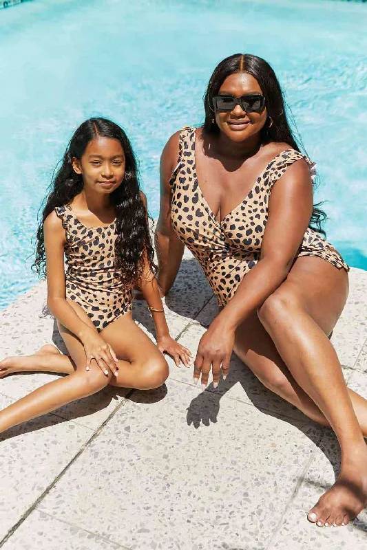 Women's Cut - Out One - Pieces in Black with Geometric Shapes for a Modern and Edgy StyleMarina West Swim Full Size Float On Ruffle Faux Wrap One-Piece in Leopard Women's Cut - Out One - Pieces in Black with Geometric Shapes for a Modern and Edgy StyleMarina West Swim Full Size Float On Ruffle Faux Wrap One-Piece in Leopard
